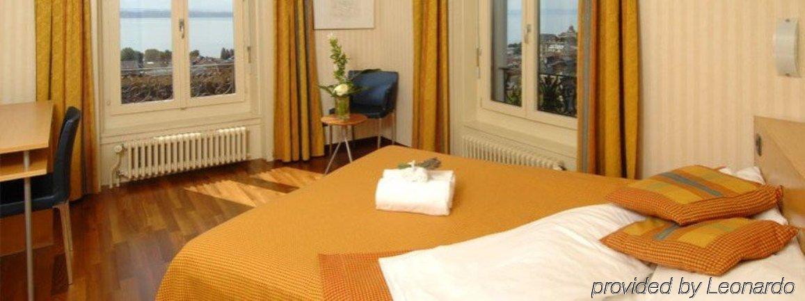 Hotel Alpes & Lac Невшатель Номер фото